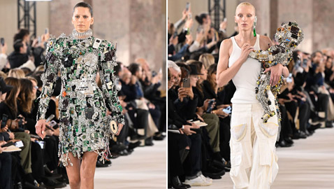 عارضة تحمل طفل (روبوت).. ما أجمل إطلالة بعرض أزياء في باريس؟