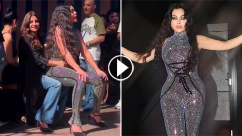 فيديوهات وصور هيفاء وهبي تشعل حفل دبي برقصها وتجلس بأحضان إحدى المعجبات