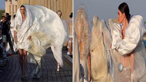 باللون الأبيض على البحر الأحمر.. عرض أزياء في المملكة العربية السعودية