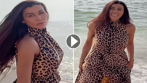نادين الراسي على شاطئ البحر بفستان بنقشة النمر والجمهور: قلبها قلب طفل (فيديو)