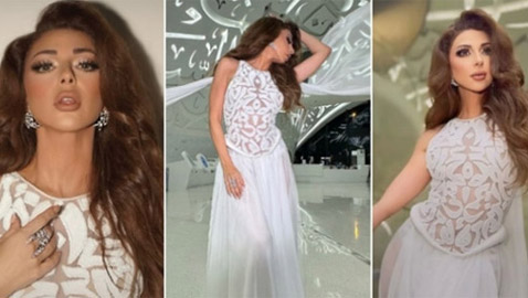 ميريام فارس بفستان شفاف أبيض منقوش بحروف عربية 