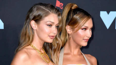 ‏جيجي وبيلا حديد تكشفان عن اختهما السرية غير الشقيقة: الحسناء أيدان نيكس