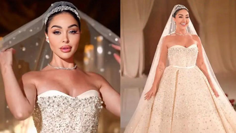  هيا كرزون شقيقة ديانا كرزون بإطلالة ملكية في حفل زفافها على رجل الأعمال عمر الكيكي